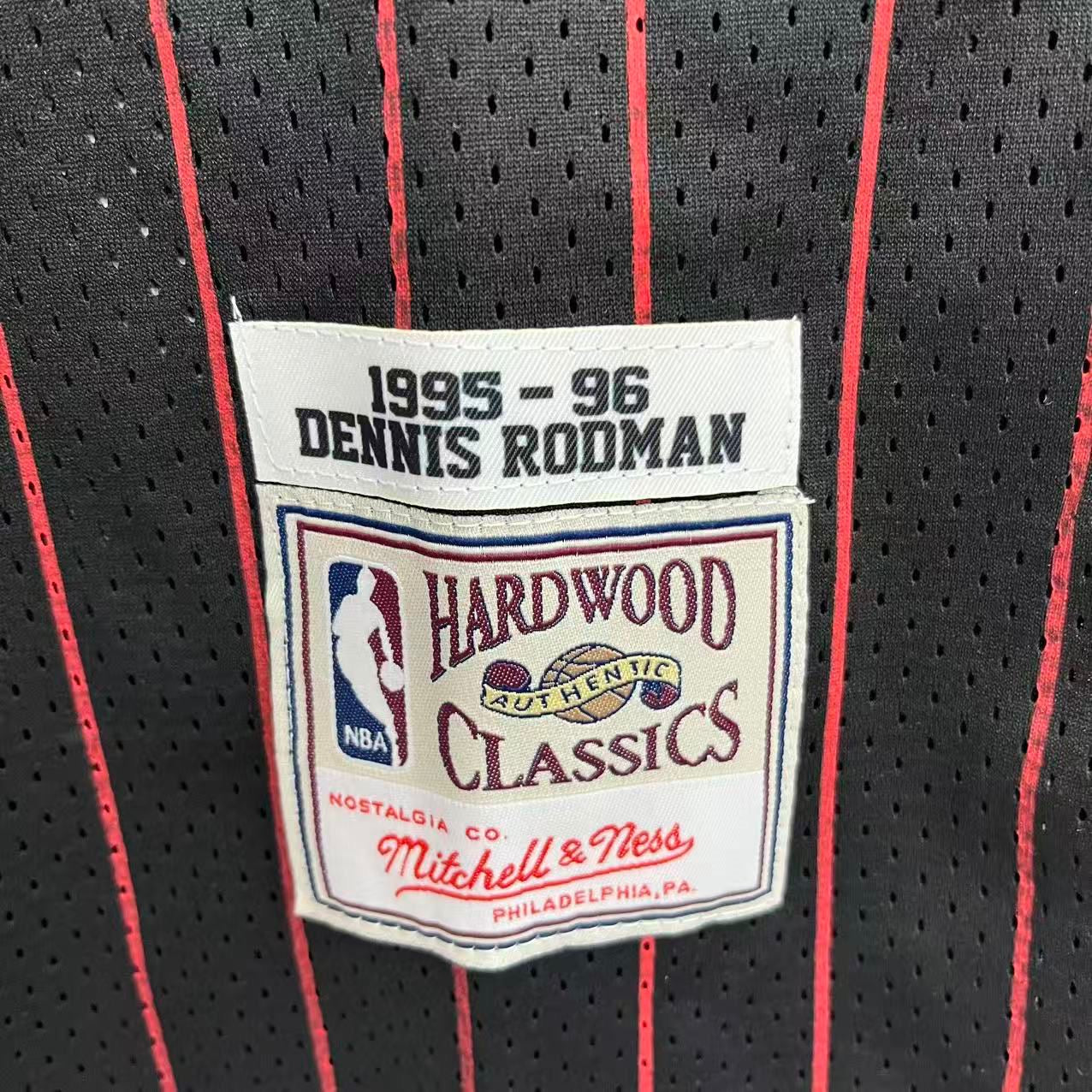 Dennis Rodman Chicago Bulls Official NBA Jersey Mitchell & Ness black pinstripes